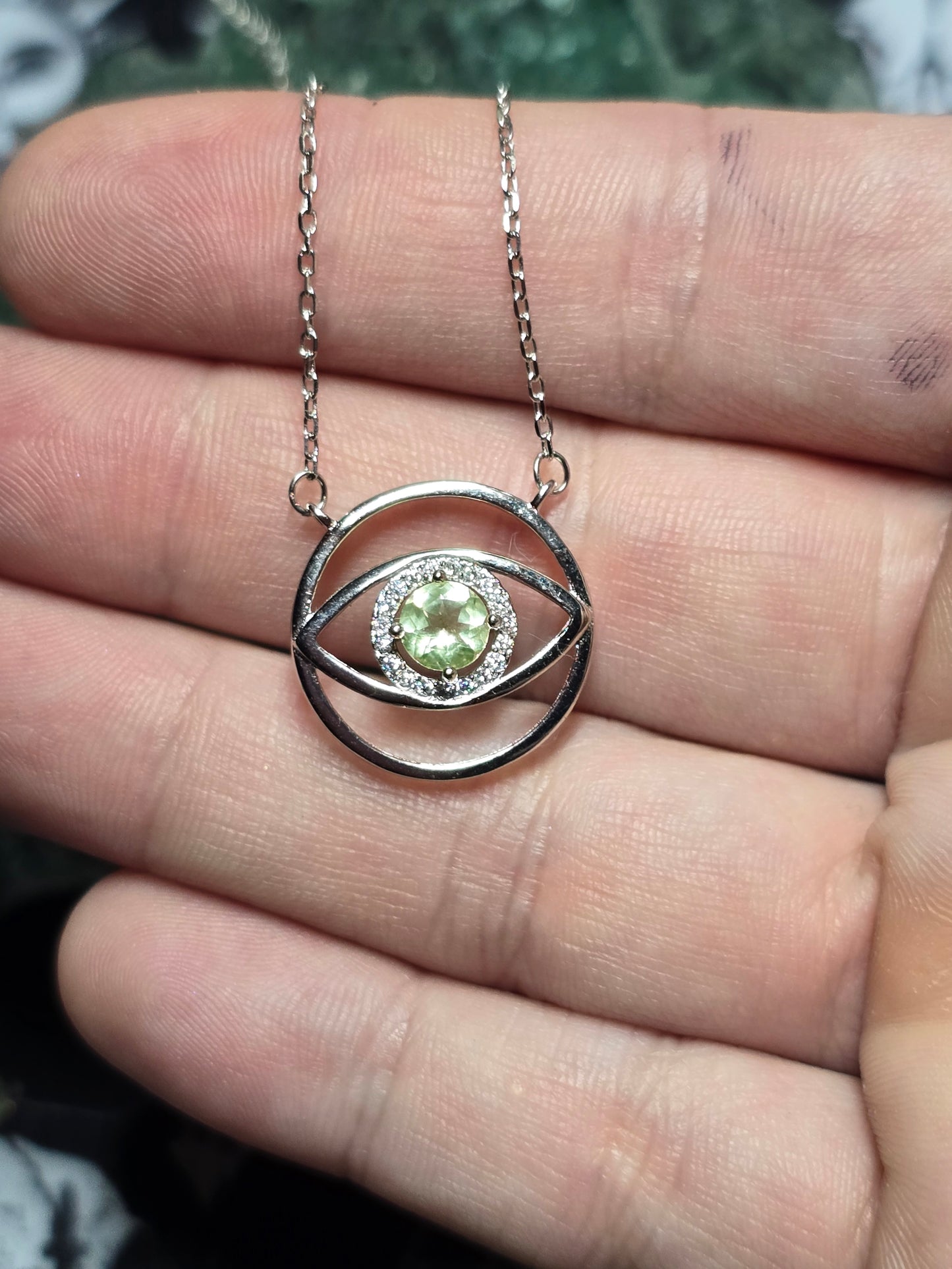 Uranium glass evil eye pendant