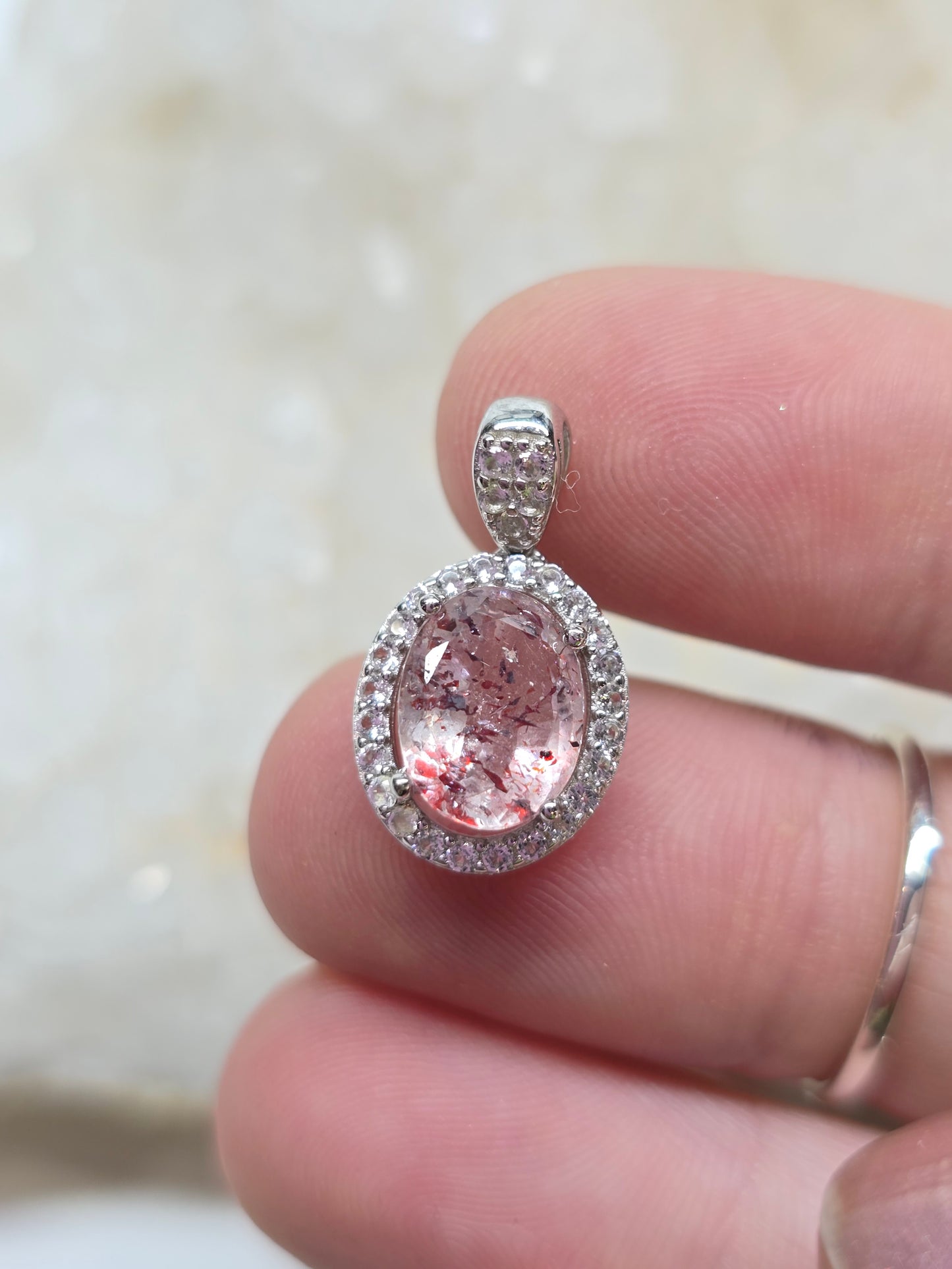 Blood shot lepidocrocite & white topaz pendant