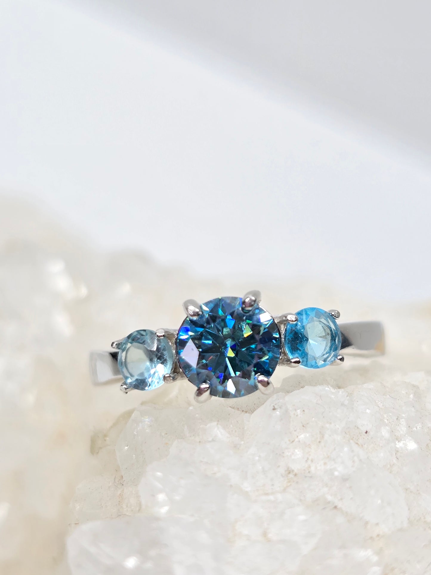 Icey blue moissanite and apatite size 8.5