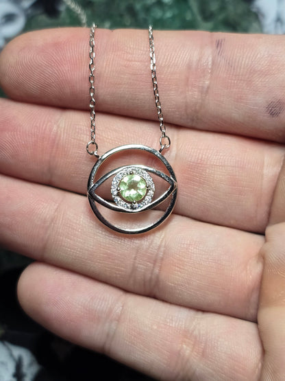 Uranium glass evil eye pendant