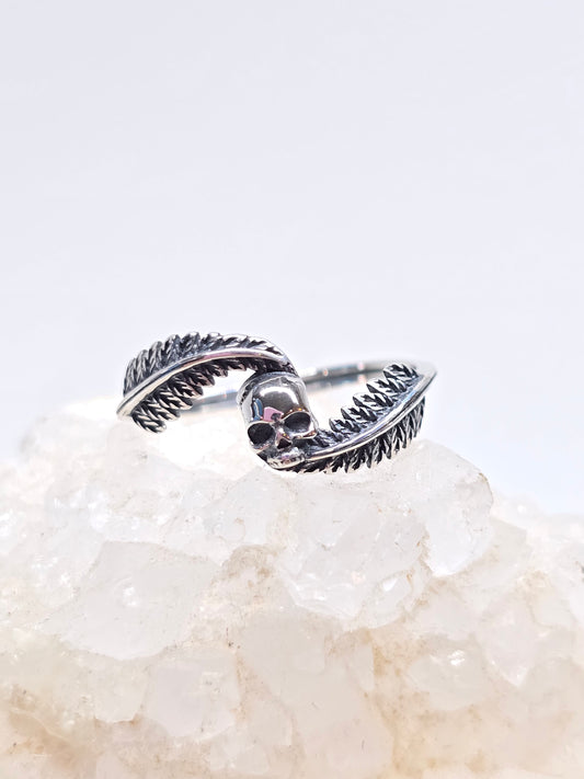 Skull and feather ring